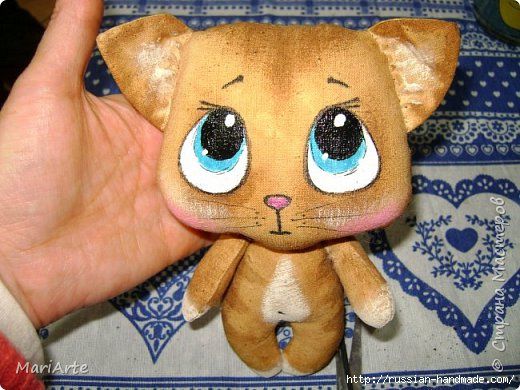 Игрушка из ткани котика